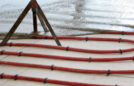 pose d'une chape sur plancher chauffant